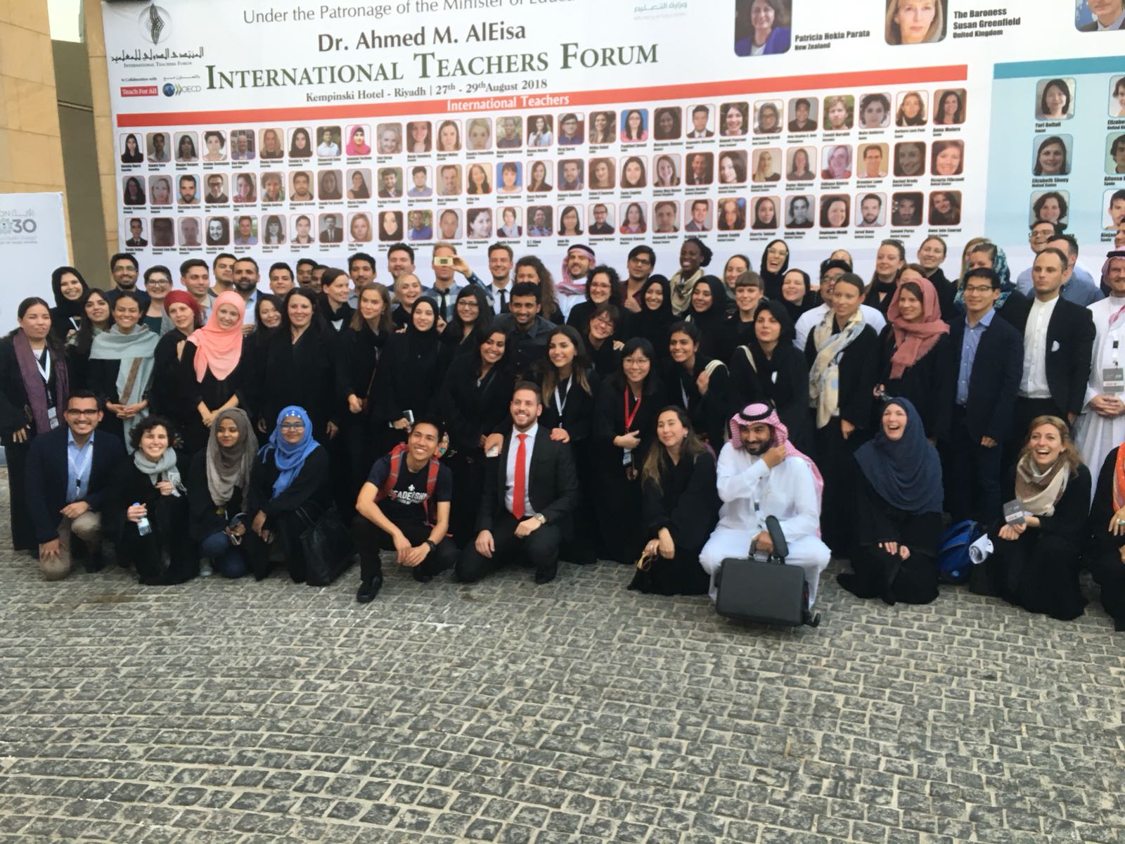 The Teach For All group in front of the forum