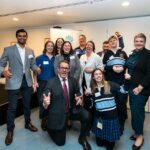 Group of smiling teachers and leaders