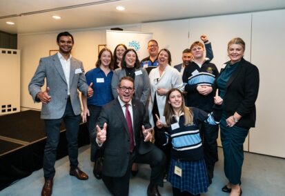 Group of smiling teachers and leaders