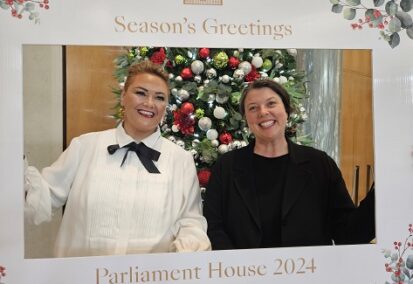 Melodie posing with Murrup's leader.